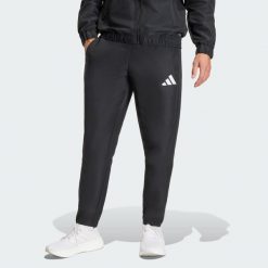 Spodnie męskie adidas Entrada 26 Presentation. Czarne spodnie materiałowe męskie Adidas, bez wzorów, z poliesteru. Za 121.99 zł.