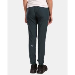 Spodnie damskie Kilpi Mimi. Zielone spodnie dresowe damskie Kilpi, na lato, xs, bez wzorów, z nylonu. Za 215.49 zł.