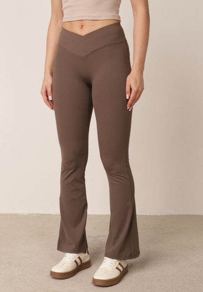 Brązowe Legginsy o Fasonie Dzwonów z Wysokim Stanem Jaenlenne. Brązowe legginsy damskie Born2be, l, bez wzorów, z jeansu. Za 79.99 zł.