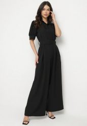 Czarny Taliowany Kombinezon z Ozdobną Klamrą Filateia. Czarne kombinezony damskie Born2be, m, bez wzorów, eleganckie, bez kołnierzyka, bez ramiączek. Za 119.99 zł.