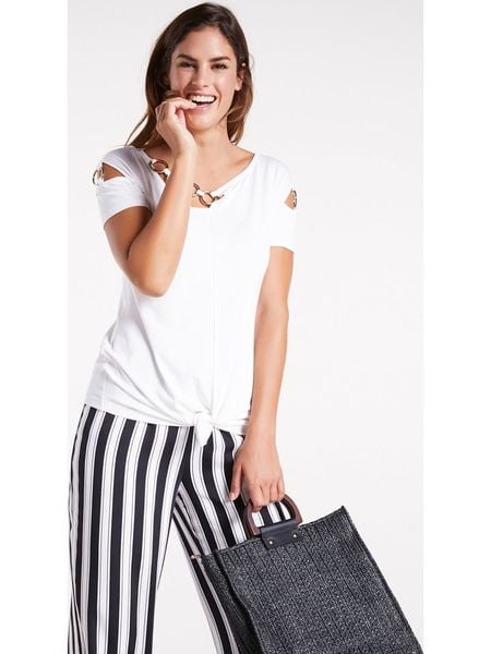 Heine Koszulka w kolorze białym rozmiar: 42. Białe t-shirty damskie Heine, z aplikacjami, bez kołnierzyka. Za 55.95 zł.