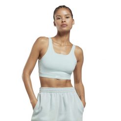 Biustonosz dla kobiet Reebok Yoga. Niebieskie biustonosze sportowe damskie Reebok, bez wzorów. W wyprzedaży za 173.95 zł.