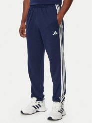 Adidas Spodnie dresowe Essentials 3-Stripes French Terry KY4197 Niebieski Regular Fit. Niebieskie spodnie dresowe męskie Adidas, bez wzorów, z bawełny. Za 218.99 zł.