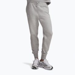 Spodnie damskie Under Armour Icon Fleece Jogger. Szare spodnie dresowe damskie Under Armour, na fitness i siłownię. Za 169.99 zł.