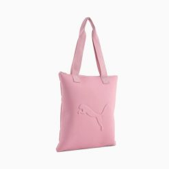 Torba damska Puma BUZZ TOTE różowa 09115710. Czerwone torebki klasyczne damskie Puma, bez wzorów, bez dodatków. Za 64.35 zł.