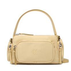 Torebka Calvin Klein. Żółte torebki klasyczne damskie CALVIN KLEIN, bez wzorów, z nylonu, bez dodatków. Za 449.99 zł.