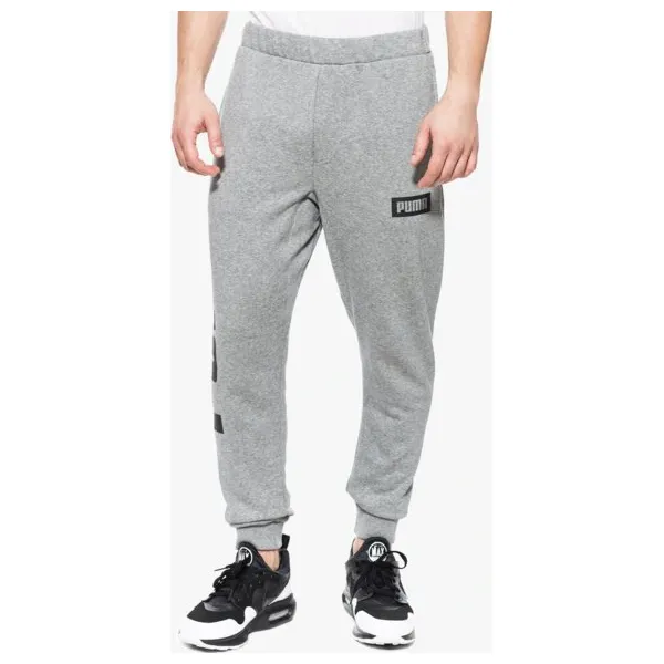 Puma Spodnie Rebel Sweat Tr , szary, rozmiar XL. Szare spodnie materiałowe męskie Puma, bez wzorów, z bawełny, klasyczne. W wyprzedaży za 129.99 zł.
