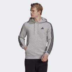Bluza męska adidas Essentials Fleece 3-Stripes Hoodie. Czarne bluzy bez kaptura męskie Adidas, m, z polaru. Za 202.00 zł.