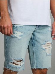 Szorty jeansowe z ozdobnymi rozcięciami - zielony. Zielone szorty męskie Sinsay, z jeansu, bez kołnierzyka. Za 59.99 zł.