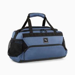 Torba treningowa unisex Puma TRAINING SMALL SPORTS niebieska 09091904. Niebieskie torebki klasyczne damskie Puma, bez wzorów, bez dodatków. Za 130.99 zł.