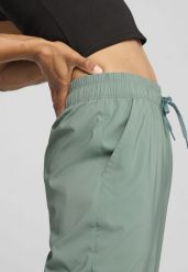 Damskie spodnie LACE PUMA Green Moon. Zielone spodnie sportowe damskie Puma, l, z tkaniny, na fitness i siłownię. Za 226.70 zł.