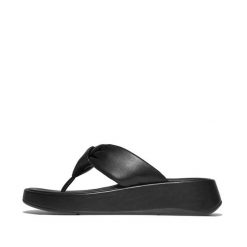 Sandały damskie FitFlop F-Mode Knot Soft-Leather Flatform Toe-Post. Czarne sandały damskie FIT FLOP, bez wzorów, z materiału, bez obcasa. Za 647.50 zł.