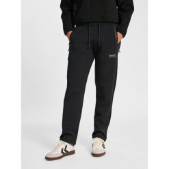 Spodnie damskie Hummel Tech. Czarne spodnie materiałowe damskie HUMMEL, bez wzorów, sportowe. Za 328.00 zł.