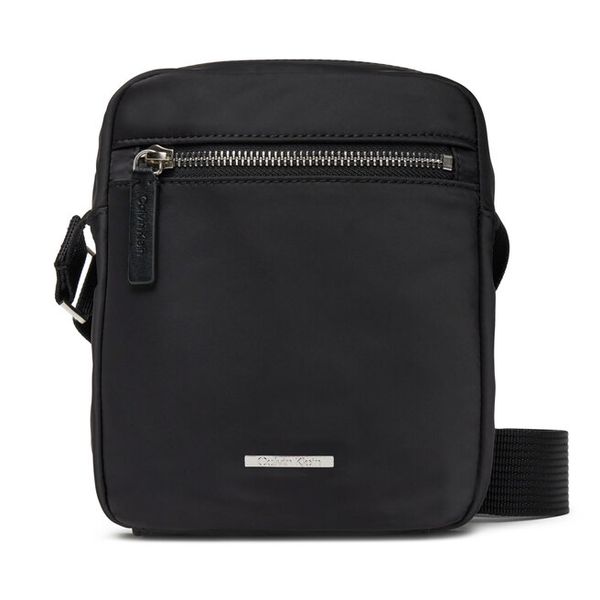 Saszetka Calvin Klein. Czarne saszetki męskie CALVIN KLEIN, z nylonu. Za 189.99 zł.