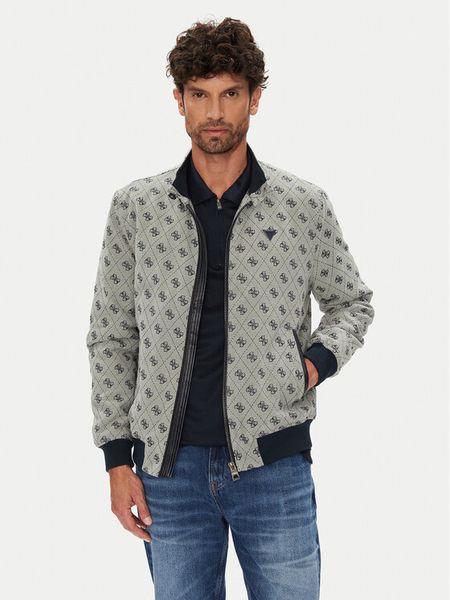 Guess Kurtka bomber M5YL04 WGUE0 Granatowy Regular Fit. Niebieskie kurtki męskie Guess, m, z aplikacjami, z syntetyku, bez kaptura. Za 479.99 zł.