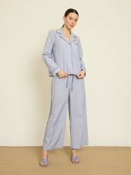 BGN Koszula w kolorze błękitnym rozmiar: 36. Niebieskie koszule damskie BGN, bez wzorów, bez kołnierzyka, bez ramiączek. Za 121.99 zł.