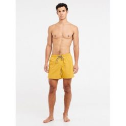 Szorty plażowe Protest Faster. Żółte szorty męskie Protest, bez wzorów. Za 169.99 zł.