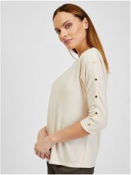 Orsay Koszulka w kolorze kremowym rozmiar: M. Brązowe bluzki damskie ORSAY, m, bez wzorów, bez kołnierzyka, bez ramiączek. Za 56.99 zł.