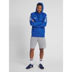 Bluza z kapturem sportowa męska Hummel Go Cotton Zip Hoodie. Niebieskie bluzy sportowe męskie HUMMEL, bez wzorów, sportowe, bez kołnierzyka, bez ramiączek. Za 190.00 zł.