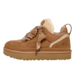 Buty do chodzenia dla dorosłych UGG Lowmel Chestnut. Brązowe buty sportowe na co dzień damskie Ugg, bez wzorów, trekkingowe. Za 723.20 zł.