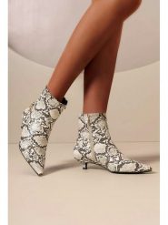 C'M Botki w kolorze kremowym rozmiar: 41. Brązowe botki damskie C'M, eleganckie, bez obcasa, na szpilce, bez zapięcia. Za 130.99 zł.