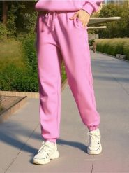 Spodnie jogger - różowy. Czerwone spodnie materiałowe damskie Sinsay, bez wzorów. Za 39.99 zł.
