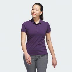Koszulka Ultimate365 Tour Twistknit Polo. Fioletowe bluzki damskie Adidas, xs, bez wzorów, z materiału, sportowe, bez kołnierzyka, bez ramiączek. Za 329.00 zł.