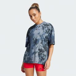 Koszulka Climacool Training Club 24/7 Graphic. Fioletowe bluzki damskie Adidas, s, bez wzorów, bez ramiączek. Za 149.99 zł.