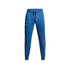 Spodnie dresowe męskie Under Armour Rival Fleece Chroma Pants. Niebieskie spodnie sportowe męskie Under Armour, z bawełny. Za 323.55 zł.