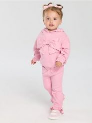 Bluza z ozdobną kokardą - różowy. Czerwone bluzy i bluzki niemowlęce Sinsay, bez wzorów, bez ramiączek, bez kaptura. Za 25.99 zł.