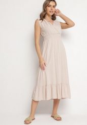 Beżowa Wiskozowa Sukienka o Kopertowym Kroju z Falbanką Uliria. Brązowe sukienki damskie Born2be, na spotkanie biznesowe, l, bez wzorów, z wiskozy, eleganckie, bez kołnierzyka, bez ramiączek, midi, kopertowe. W wyprzedaży za 63.99 zł.