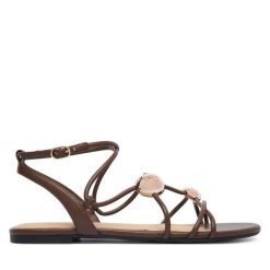Sandały Guess. Brązowe sandały damskie Guess, z aplikacjami, bez obcasa, na płaskiej podeszwie. Za 444.99 zł.