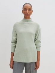 Someday Sweter w kolorze jasnozielonym rozmiar: 38. Zielone golfy damskie Someday, bez wzorów, z wełny, bez ramiączek. Za 180.06 zł.