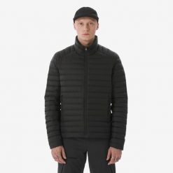 Kurtka trekkingowa męska puchowa MT100 - 3°C. Czarne kurtki męskie FORCLAZ, na zimę, l, bez wzorów, z materiału, klasyczne, bez kaptura. Za 269.99 zł.