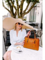 Lia Biassoni Skórzana torebka "Acco" w kolorze karmelowym - 32 x 22 x 12 cm rozmiar: onesize. Brązowe torebki klasyczne damskie Lia Biassoni, bez wzorów, z materiału, bez dodatków. Za 327.87 zł.