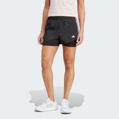 Szorty Pacer 3-Stripes Training Woven. Czarne spodenki sportowe damskie Adidas, bez wzorów, z materiału, sportowe. Za 179.00 zł.