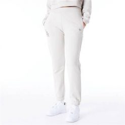 Spodnie sportowe damskie New Era 60435304. Białe spodnie dresowe damskie New Era, m, z dresówki. Za 532.00 zł.