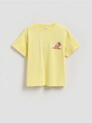 Bawełniany t-shirt z aplikacją - jasnożółty. Żółte koszulki dziewczęce Reserved, z aplikacjami, z bawełny, bez ramiączek. Za 39.99 zł.