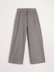Spodnie wide leg - wielobarwny. Spodnie materiałowe damskie Sinsay, bez wzorów. Za 39.99 zł.