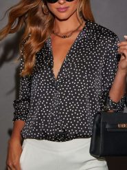 Milan Kiss Bluzka w kolorze czarno-białym rozmiar: M. Czarne bluzki damskie Milan Kiss, m, bez wzorów, bez kołnierzyka, bez ramiączek. Za 126.99 zł.