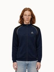 Bluza Le Coq Sportif Coq D'argent N°1. Niebieskie bluzy sportowe męskie Le Coq Sportif, bez wzorów, z materiału, eleganckie, bez kołnierzyka, bez ramiączek. Za 472.00 zł.