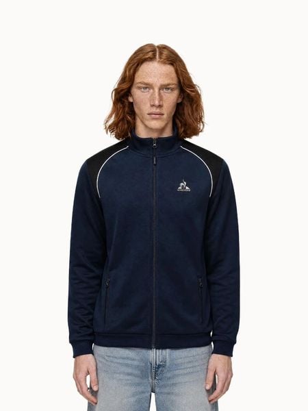 Bluza Le Coq Sportif Coq D'argent N°1. Niebieskie bluzy sportowe męskie Le Coq Sportif, bez wzorów, z materiału, eleganckie, bez kołnierzyka, bez ramiączek. Za 472.00 zł.