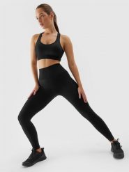 4F Legginsy treningowe bezszwowe damskie - czarne XS/S. Czarne legginsy sportowe damskie 4f, l, bez wzorów, z dzianiny, z podwyższonym stanem, na fitness i siłownię. W wyprzedaży za 79.99 zł.