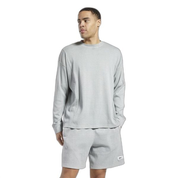 Bluza z dekoltem w kolorze naturalnym Reebok Classics. Szare bluzy sportowe damskie Reebok, s, bez wzorów, bez ramiączek, bez kaptura. W wyprzedaży za 226.20 zł.