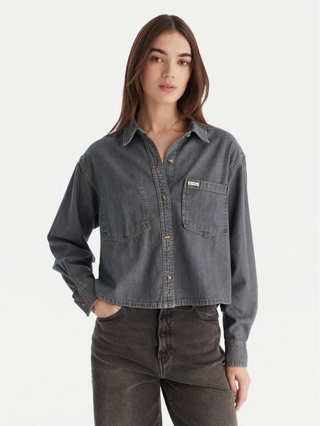 Guess Jeans Koszula jeansowa W5BH0D D5M8E Niebieski Relaxed Fit. Niebieskie koszule damskie Guess Jeans, m, z aplikacjami, z bawełny, bez kołnierzyka, bez ramiączek. Za 349.99 zł.