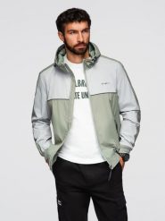 Męska kontrastowa kurtka wiatrówka z kapturem - oliwkowo-szara V3 - Rozmiar: S. Szare kurtki treningowe męskie Ombre Clothing, m, z aplikacjami, z gumy. Za 299.99 zł.