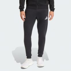 Spodnie dresowe Entrada 26. Białe spodnie dresowe męskie Adidas, bez wzorów, z dresówki. Za 199.00 zł.