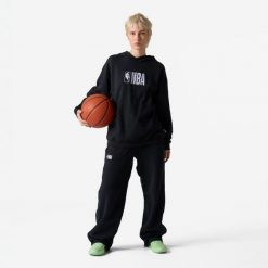 Spodnie do koszykówki unisex Tarmak NBA. Czarne spodnie sportowe damskie KIPSTA, m, z bawełny, na fitness i siłownię. Za 129.99 zł.