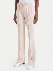 Lacoste Spodnie dresowe XF9313 Różowy jasny Regular Fit. Czerwone spodnie dresowe damskie Lacoste, bez wzorów, z dresówki. Za 769.99 zł.