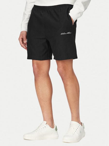 Calvin Klein Jeans Szorty sportowe LV04RF252G Czarny Regular Fit. Czarne szorty męskie Calvin Klein Jeans, bez wzorów, z bawełny, sportowe. Za 331.99 zł.
